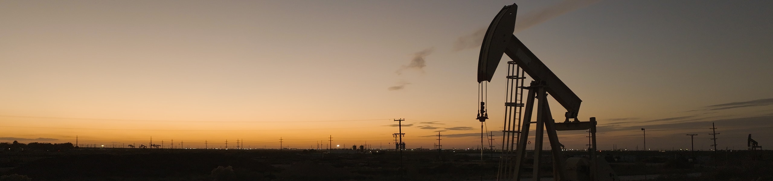 Image of oil field and equipments.