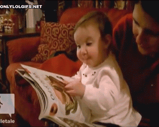 humorous GIF of baby reading